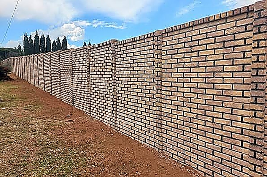 Long brick perimeter wall installation - Zwartkop, Centurion