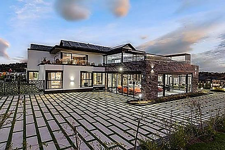 Luxury double-storey home with stone cladding and solar installation - Six Fountains, Centurion